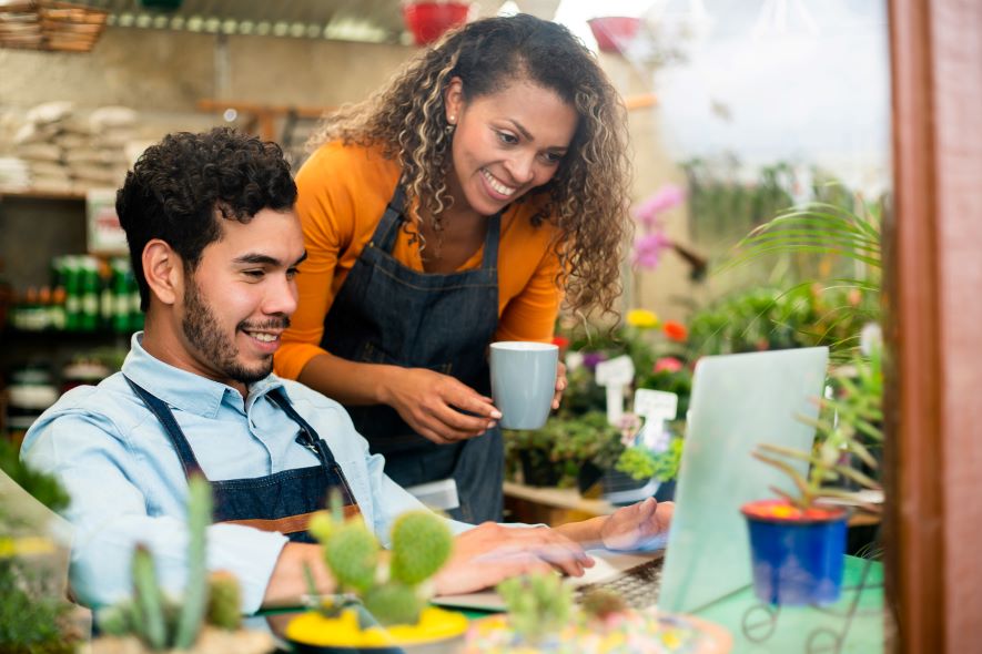 business owner working with employee