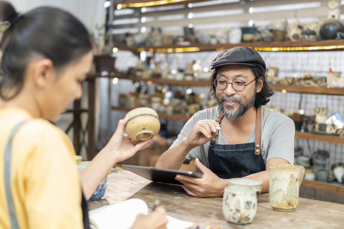 small business owner helping service a customer