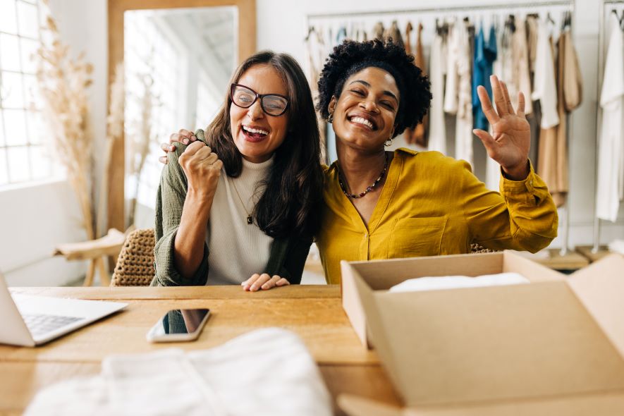 small business owners celebrating success
