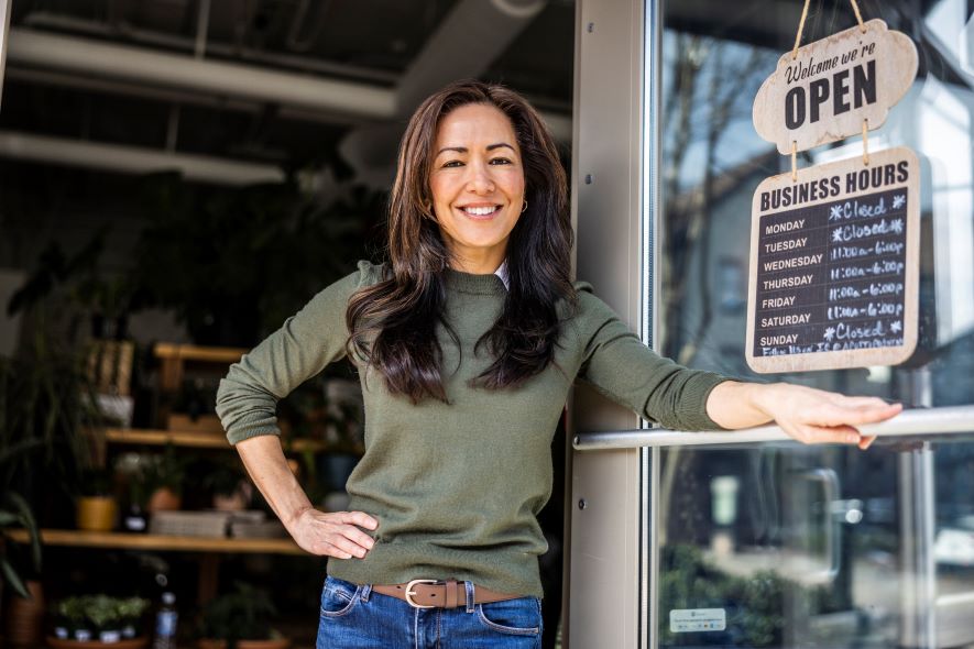 small business owner utilizing AI tools for marketing