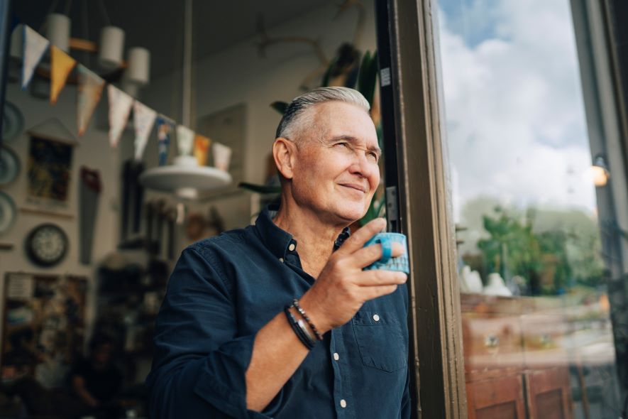 small business owner helping team to create benefits package